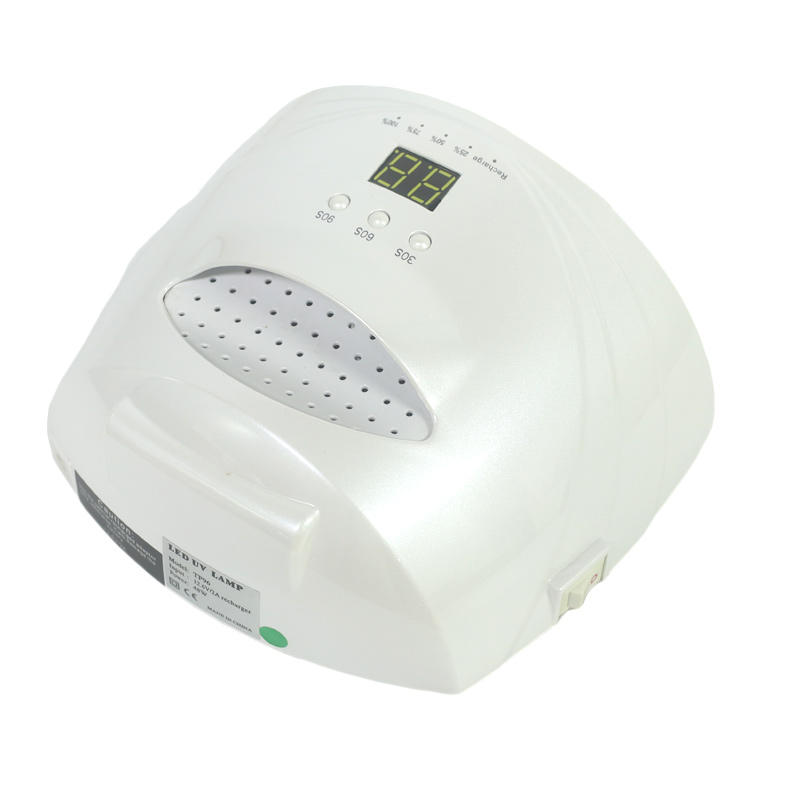 Nageldroger met telefoonhouder